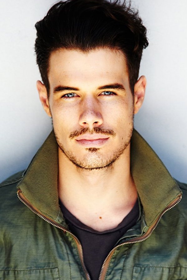 Liam Hall as Ren in Wicked
