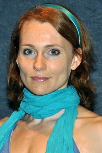 Laura Ruttkay as Bíró Margit  (2. résztől) in Puskás Öcsi és Barátai