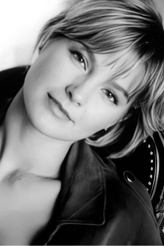 Kimberly Rowe as Angie in Emmanuelle: First Contact