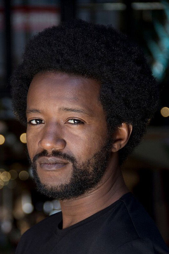 Eric Kabongo as Yao in Earth and Blood