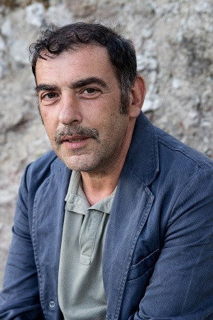 Claudio Collovà as Zio Saro in Alone With Her Dreams