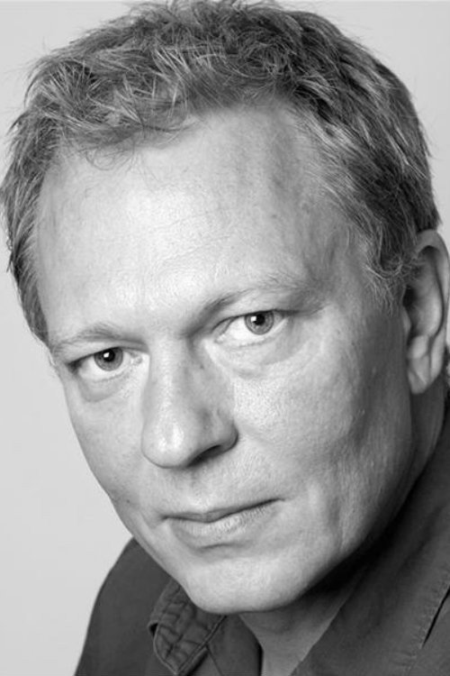 Conor Mullen as John McGinley in Reckless