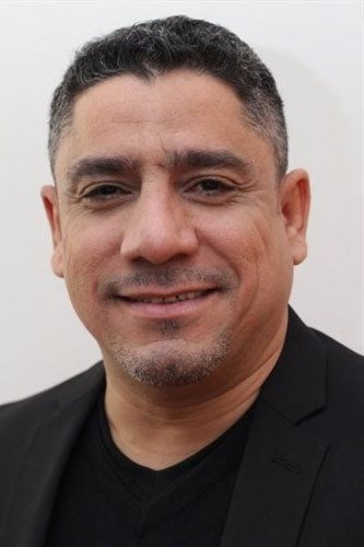 Marcos A. Gonzalez as Emilio in Holiday in the Hamptons