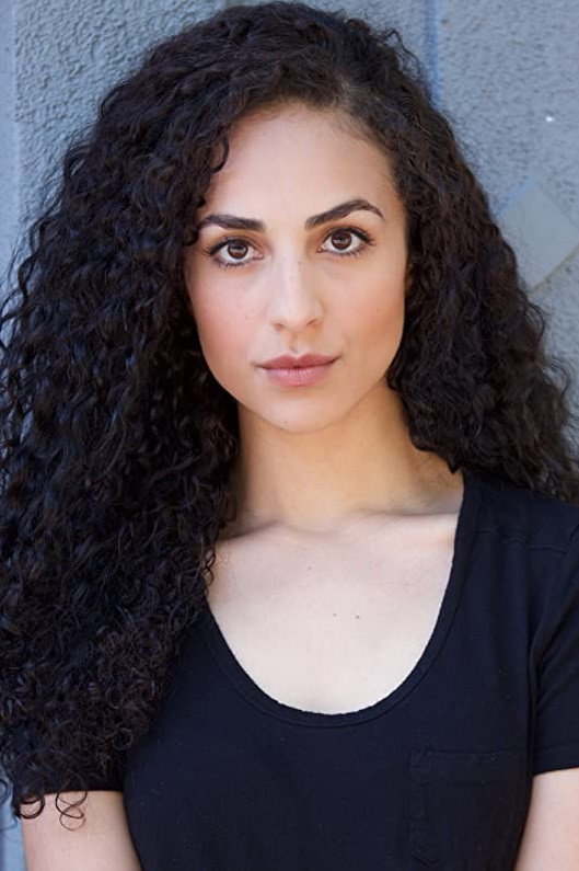 Parmiss Sehat as Marcie Jones in A Very Merry Bridesmaid