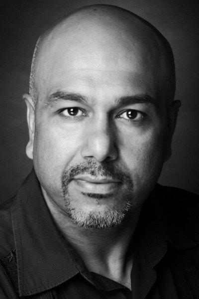 Kriss Dosanjh as Young Rowan Anwar in Steeltown Murders