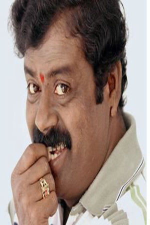 Karibasavaiah as the college principal in Rocky