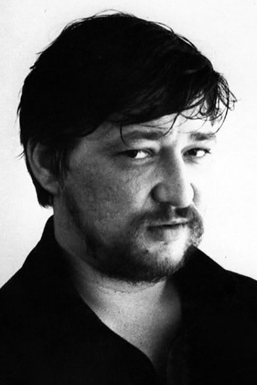 Rainer Werner Fassbinder as Flecklbauer in Mathias Kneißl