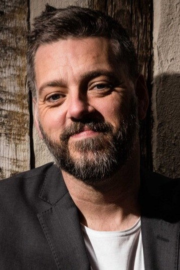 Iain Lee as Billy Hitchens in The Persuasionists