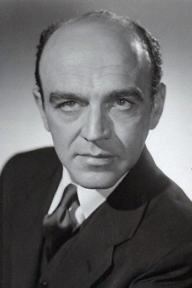 Herbert Berghof as Prime Minister Andreas Ordy in Assignment: Paris
