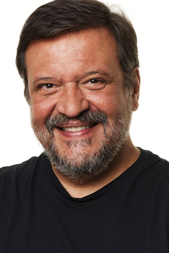 Luís Melo as Rubens Del Rey Villar (Rubinho) in Cara & Coroa