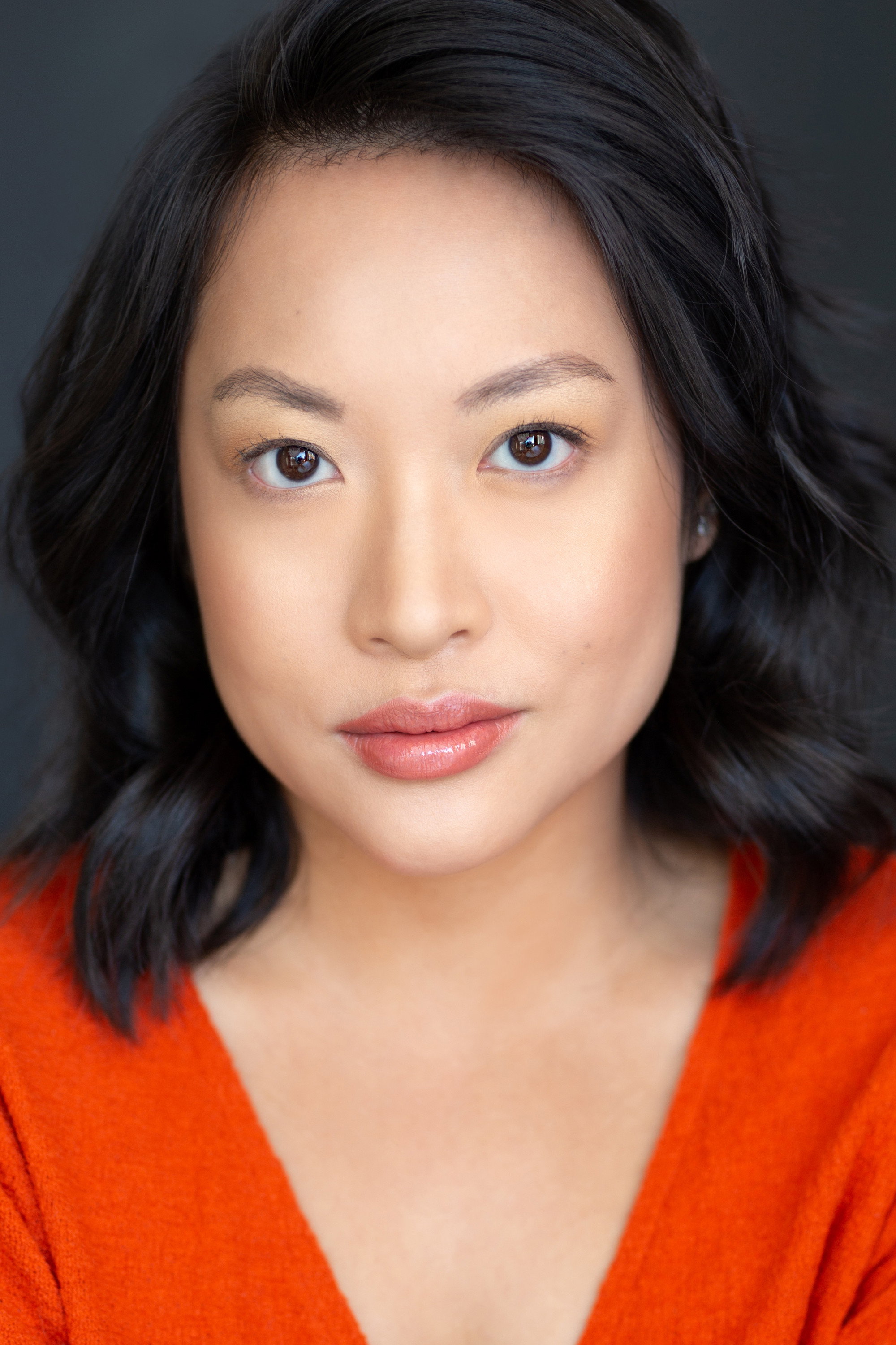 Marissa Leong as Holly Matthews in A Tale of Two Christmases