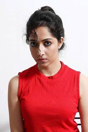 Amrita Chattopadhyay as Reshmi Merry Mal in A Holy Conspiracy