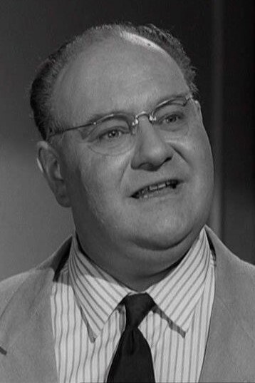 Guy Deghy as The Priest in A Walk with Love and Death