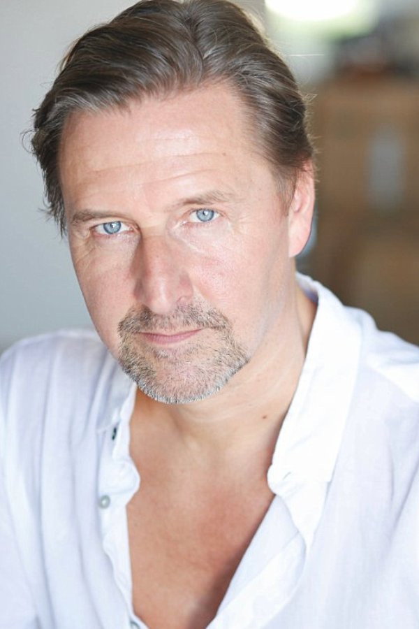 Christian Stamm as Hans in Smoke & Mirrors
