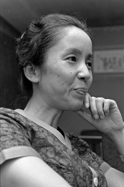 奈良岡朋子 as Kinuyo Tsutsui in Railways