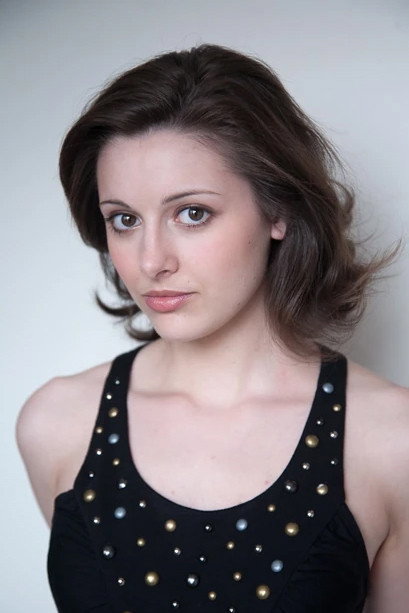 Vivien Cardone as Belle in All Roads Lead Home