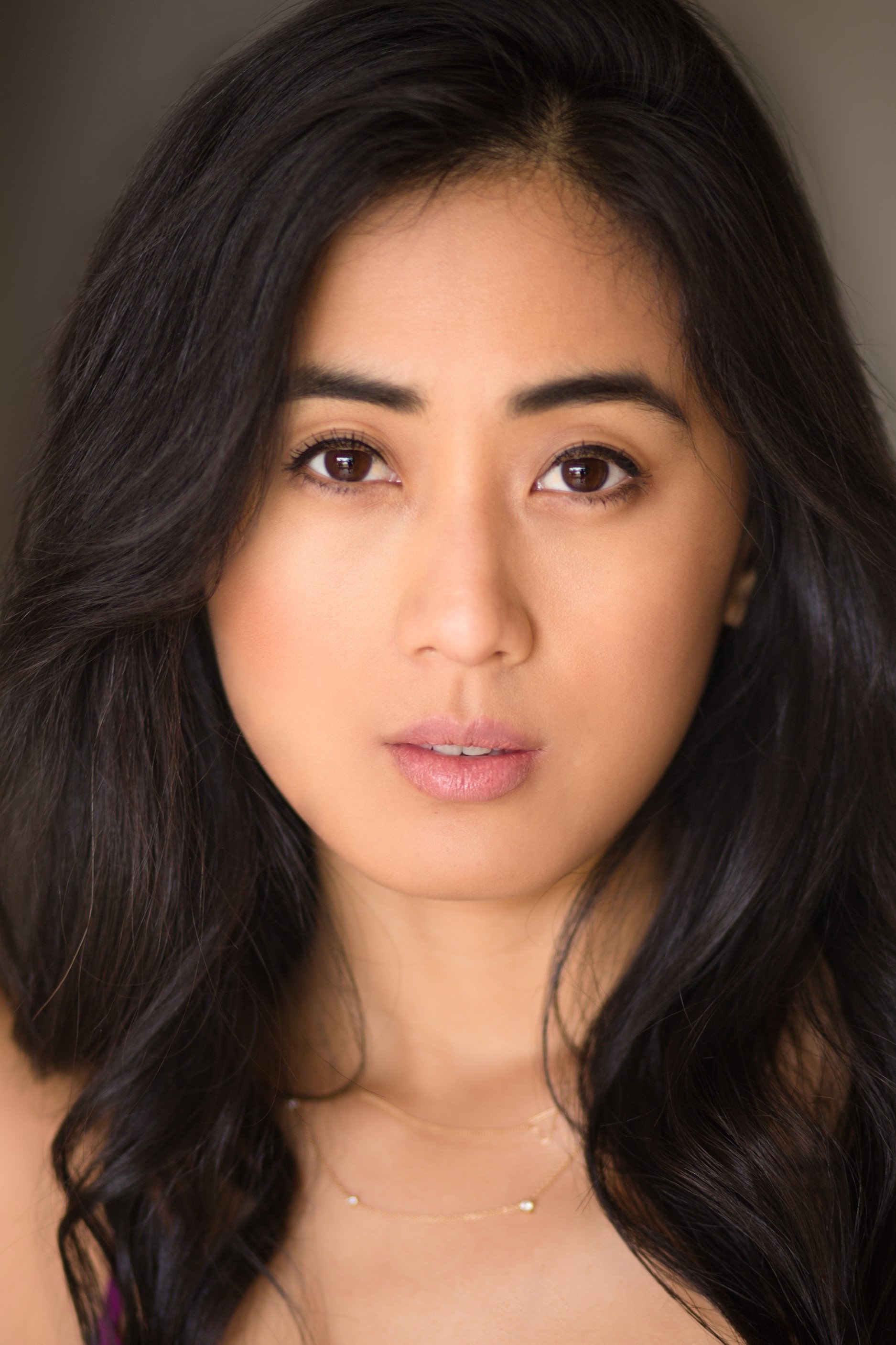 Elizabeth Trieu as Violet Burns in Erzulie
