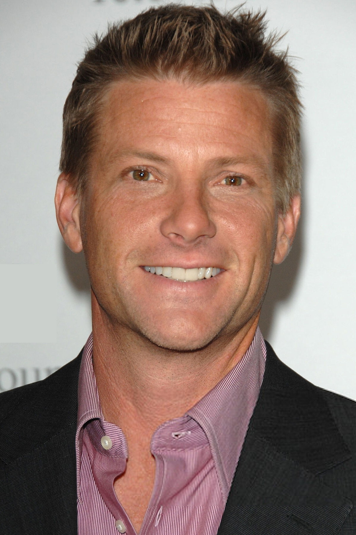 Doug Savant as Tom Scavo in Desperate Housewives