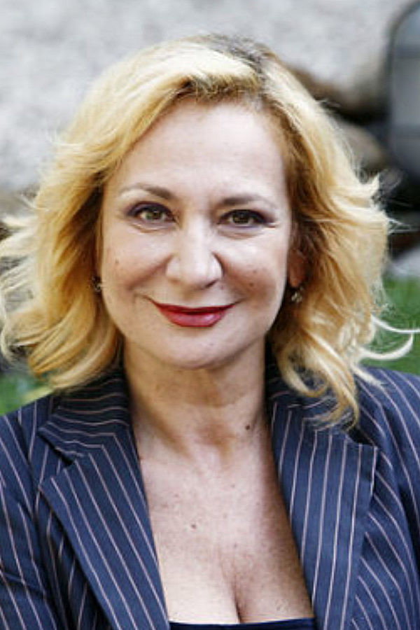 Monica Scattini as Serena in Maniaci sentimentali