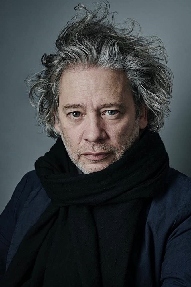 Dexter Fletcher as Charles Highway in The Rachel Papers