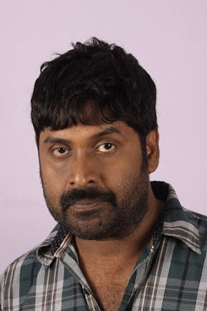 Vijayakumar as Manu in Nariman