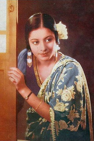 Kanan Devi as Meena Devi in Shesh Uttar