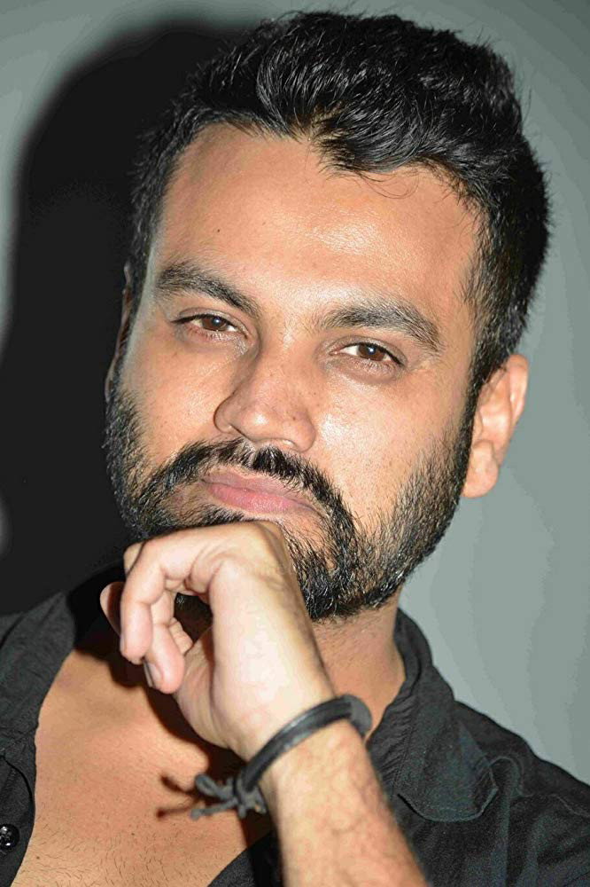 Tilak Shekar as Dev in Iruvudellava Bittu
