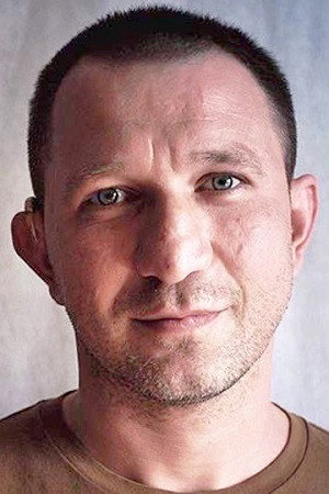 Михаил Хуранов as Хищник in The Surgeon