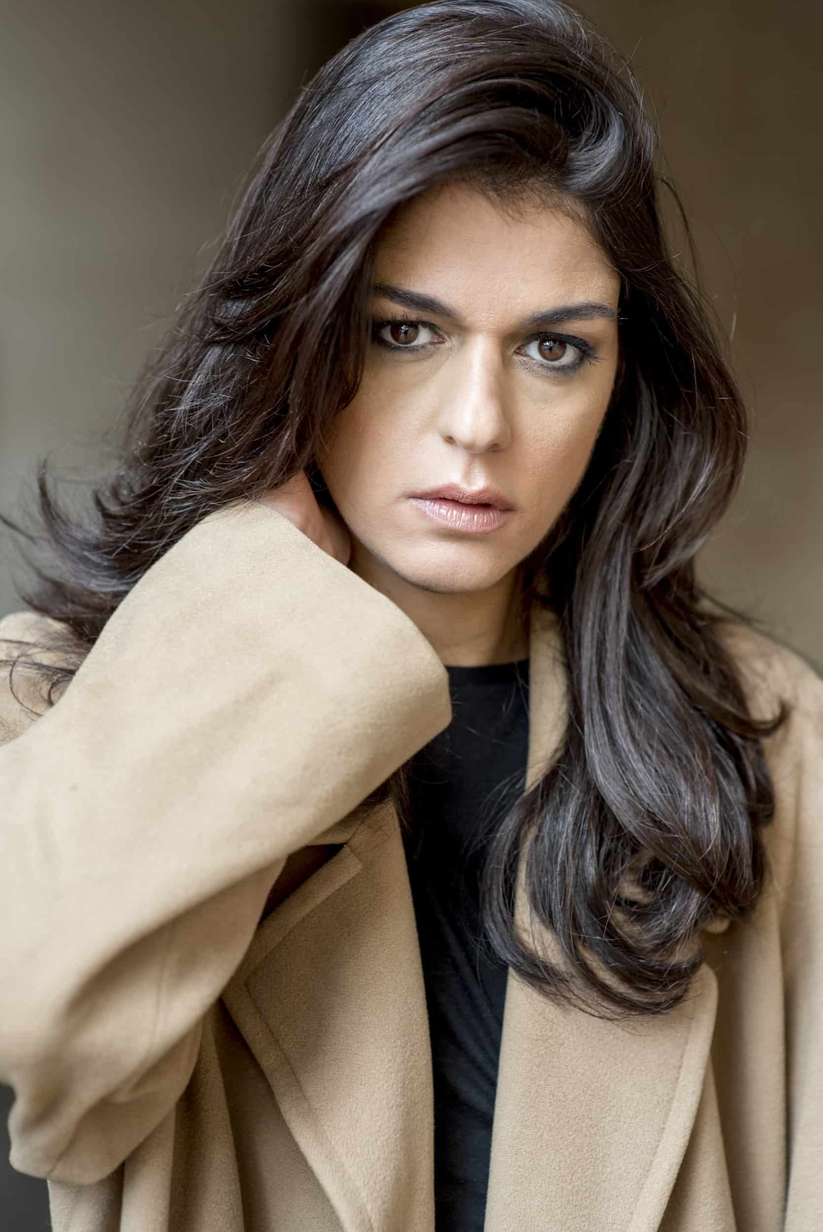 Angela Favella as Ester in Ritoccàti
