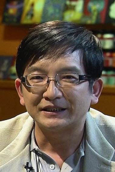 溫吉興 as Temple Host in Tic Talk