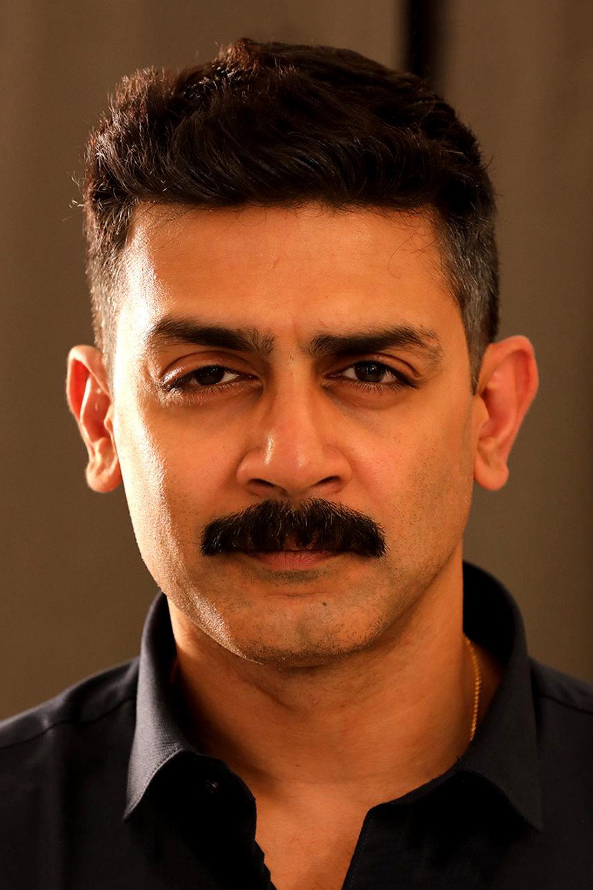 Raghu Mukherjee as Prathap Mishra in Inspector Vikram