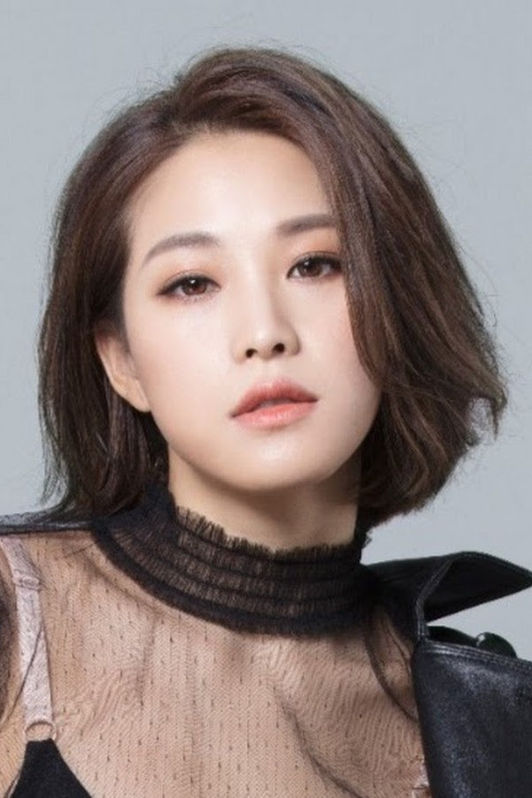 Cheronna Ng as Zhang Dee Yi in King of Mahjong
