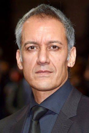 Tanveer Ghani as Clerk in Half the Picture