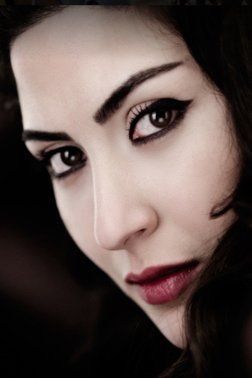 Romy Melhem as Her in Status Quo