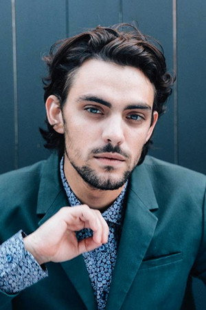 Dakota Shapiro as Tom in The Lemurian Candidate