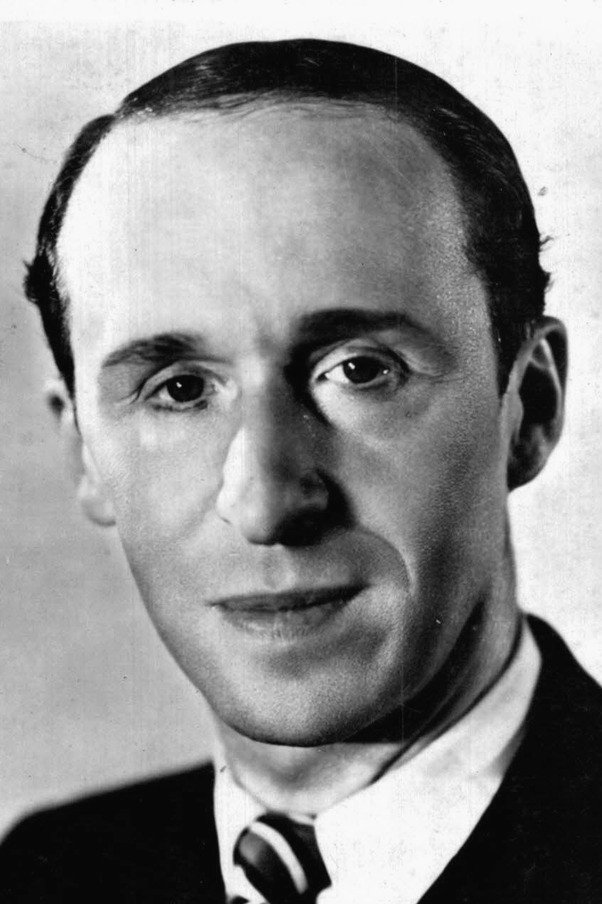 Armand Bernard as Lademann, Quick's manager in Quick