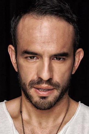 Guillermo Iván as Joel Benítez in Al otro Lado del Muro