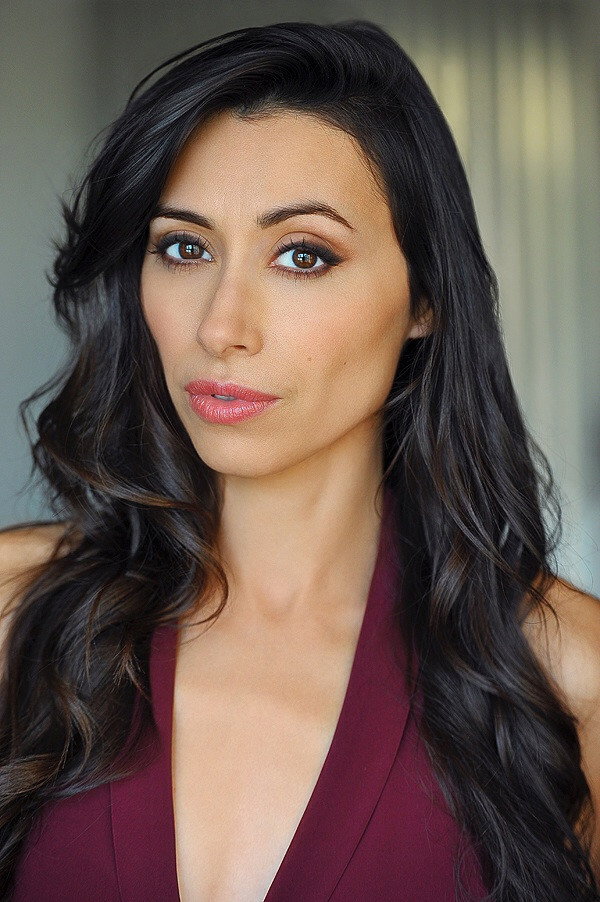 Carmen Corral as Elisa in Revolución