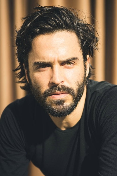 Assaad Bouab as Fabrice de Sauveterre in The Pursuit of Love