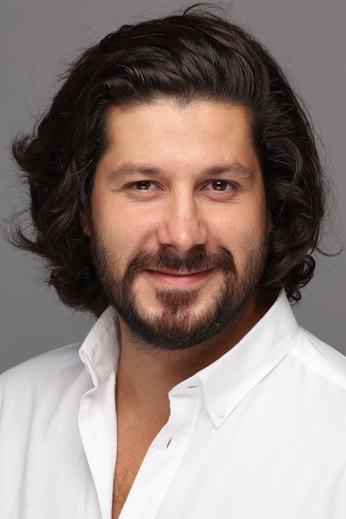 Orhan Kanalp as Alâeddin Özdenören in The Seven Beautiful Men