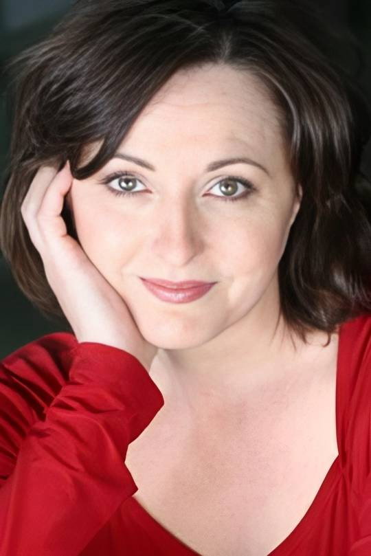 Susan Glover as Ms. Atoll in Radio Active