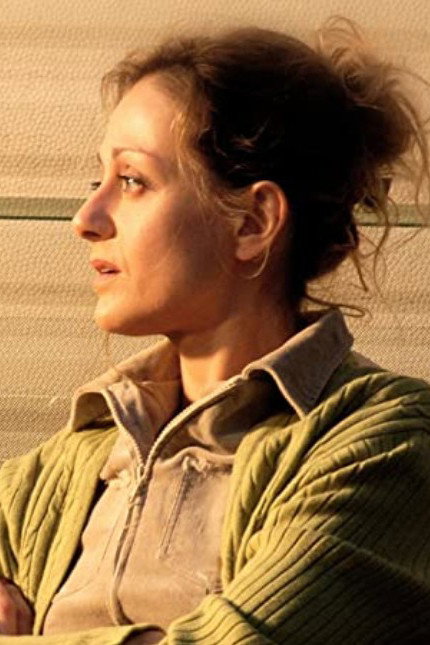 Ιωάννα Τσιριγκούλη as Rina in Burning Heads