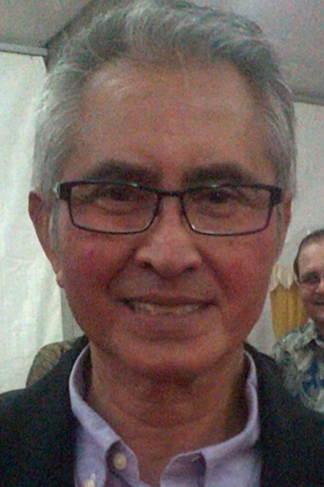 Pong Harjatmo as Pak Guru Rahman in Si Anak Kampoeng
