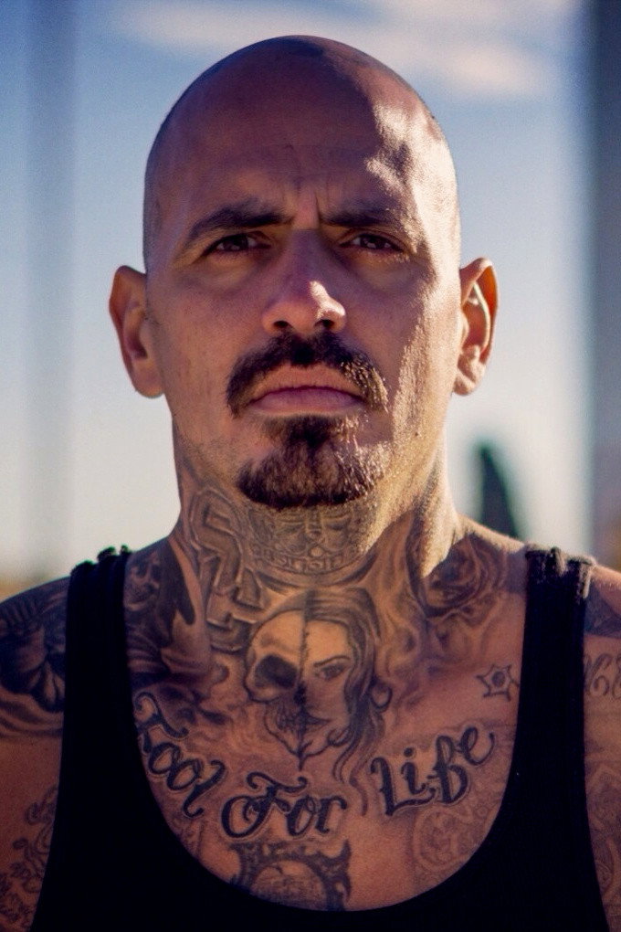 Michael Flores as The Mystery Man in Boost