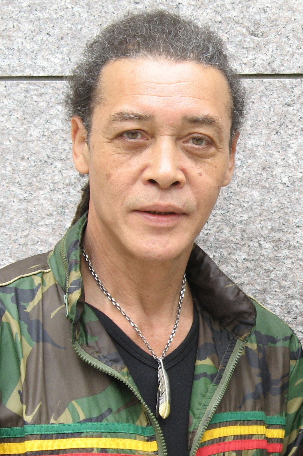 ジョー山中 as Man in photograph in The Story of PuPu