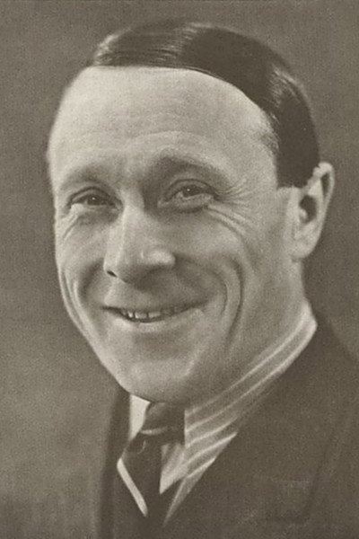 Hans W. Petersen as Grocer in Hunger
