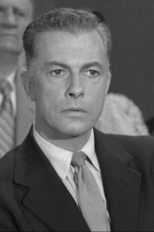 William Roerick as Frederick W. Rochelle in Not of This Earth