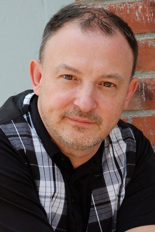Sylvain Pesant as L'entraîneur in Marée noire