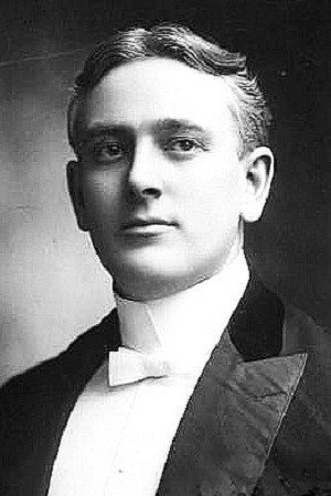 Dean Raymond as Mr. Chalmers in Conquered Hearts